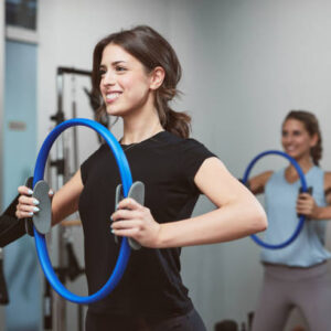 Young women exercising in a gym.