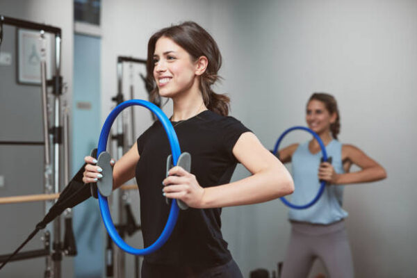 Young women exercising in a gym.
