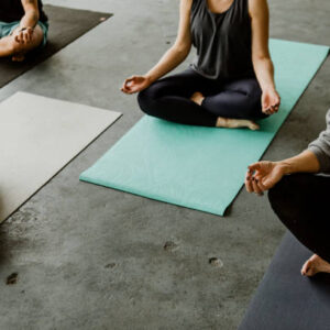 People meditating in a yoga class