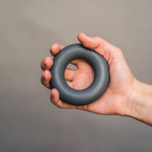 Sport and fitness concept. a hand with expander.